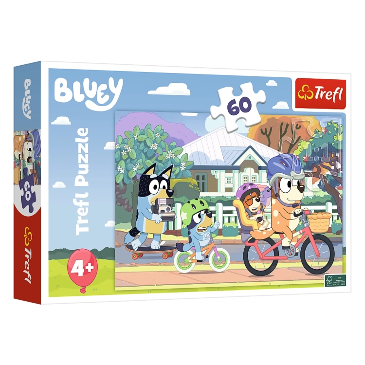 Opakowanie puzzli Trefl z motywem z kreskówki "Bluey", przedstawiające Bluey i jej rodzinę na rowerowej przejażdżce. Puzzle składają się z 60 elementów i są przeznaczone dla dzieci powyżej 4 lat.