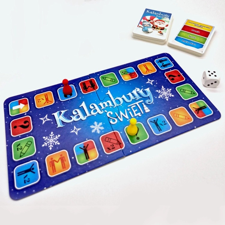 Kalambury Święta - plansza i pionki: Plansza do gry "Kalambury Święta" w niebieskiej kolorystyce z ilustracjami symboli i pionkami w różnych kolorach.