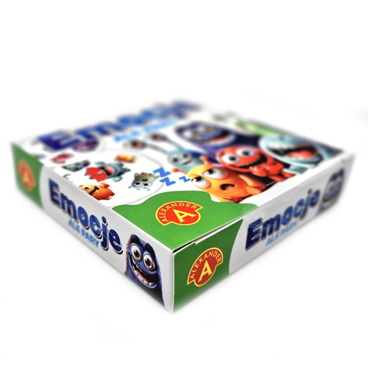 Emocje Ale Pary - bok opakowania: Widok boczny opakowania gry "Emocje - Ale Pary" z logo marki Alexander oraz grafiką wesołych potworków.