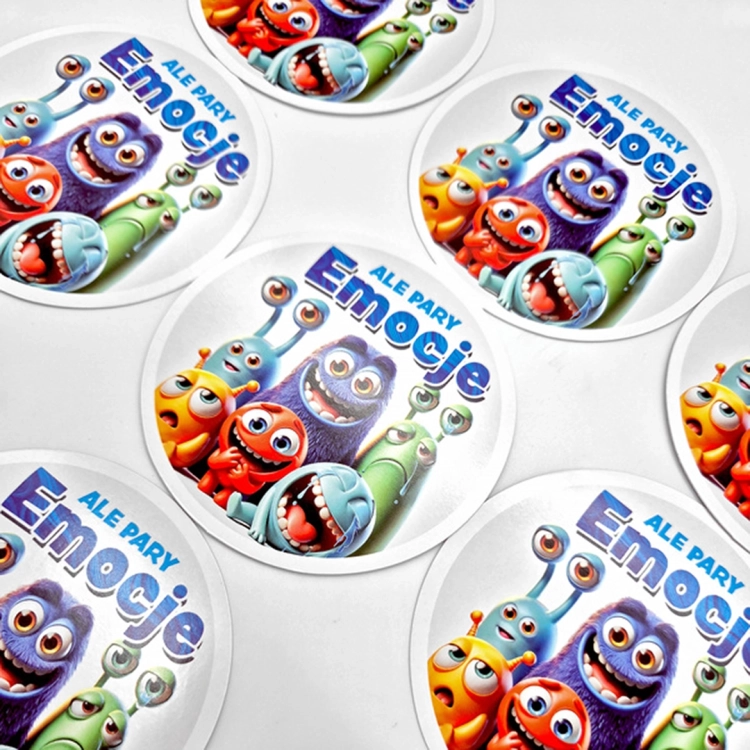 Emocje Ale Pary - karty z potworkami: Rozłożone okrągłe karty do gry "Emocje - Ale Pary" z różnymi zabawnymi potworkami na białym tle.