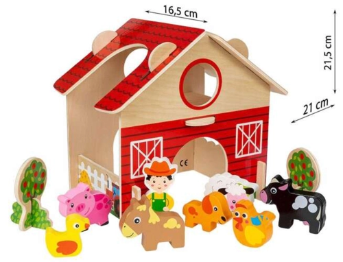 Widok na farmę Smily Play z różnymi figurkami zwierząt, w tym koniem, psem, świnką i owcą oraz figurką farmera.