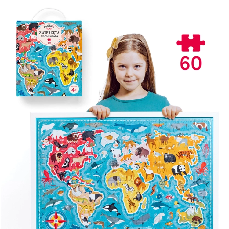 Dziewczynka trzymająca pudełko i mapę puzzli "Zwierzeta Mapa Świata" od CzuCzu
