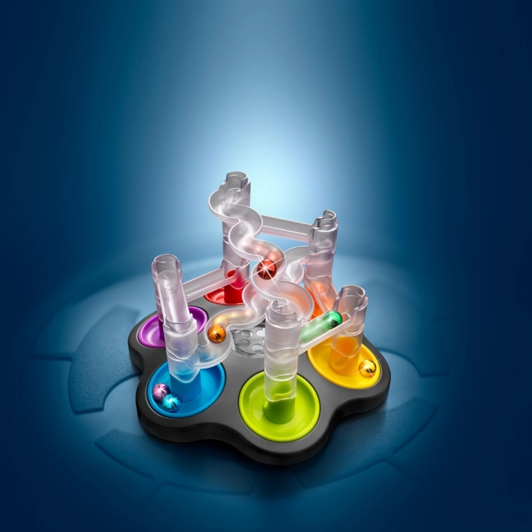 Podświetlona gra Dropzone z transparentnymi rurkami i kolorowymi kulkami.