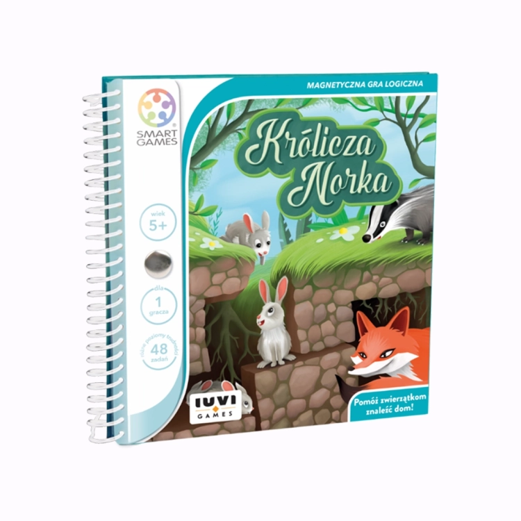 Opakowanie gry Królicza Norka na tle białego stołu