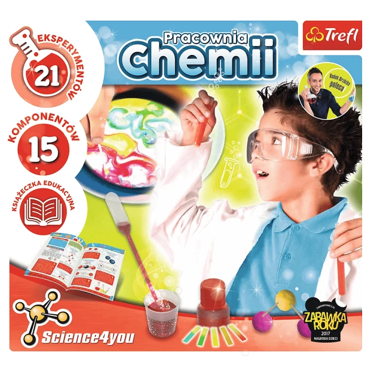 Dziecko przeprowadzające eksperyment chemiczny z zestawu Trefl.