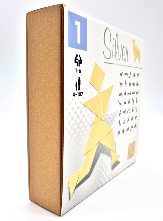 Opakowanie gry tangram silver z ukazanym wzorem i przykładowymi układankami.
