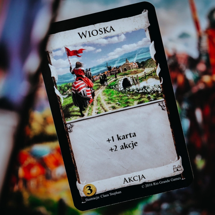 Karta Wioska z gry Dominion II Edycja – ilustracja na tle planszy