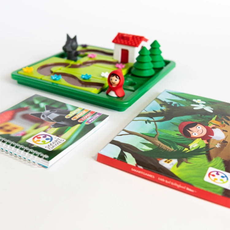 Plansza do gry Czerwony Kapturek SmartGames z figurkami i elementami ścieżki.