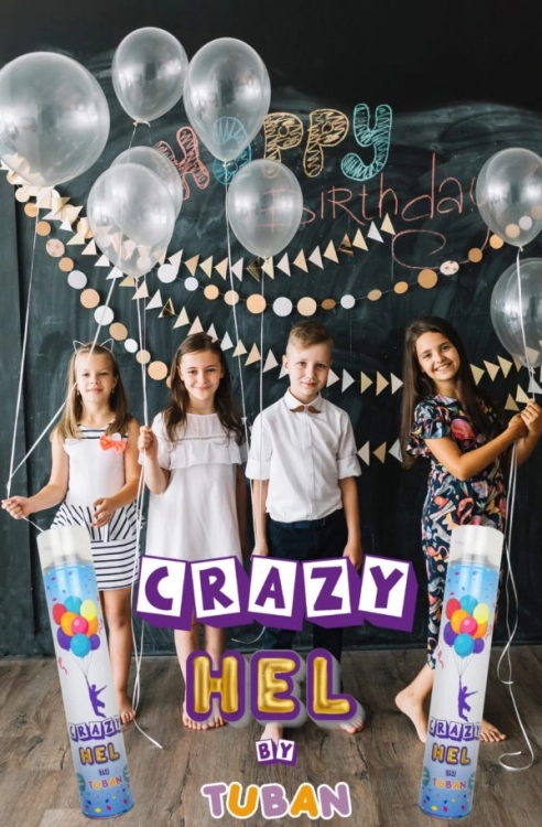 Grupa dzieci w kolorowych strojach z balonami, reklamująca Crazy Hel Tuban