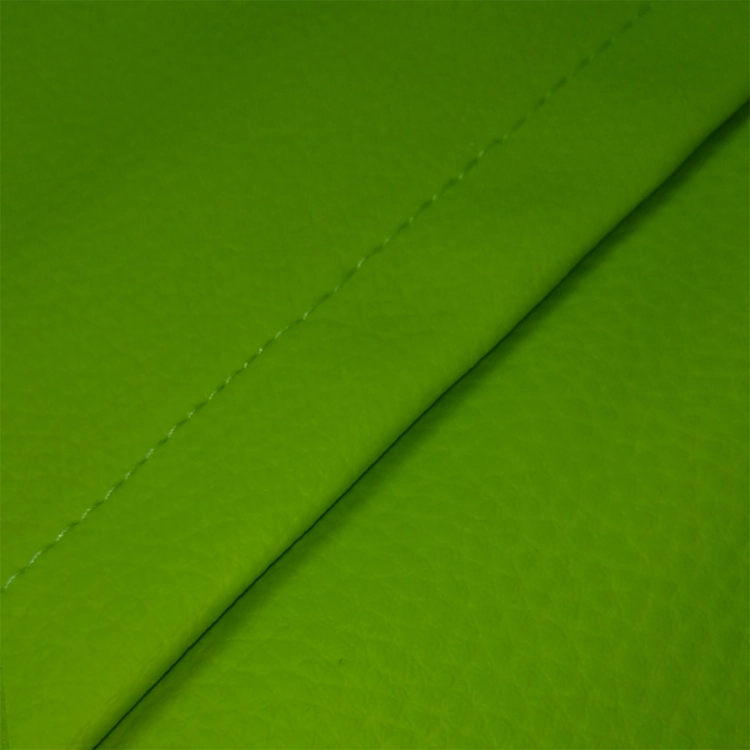 Zbliżenie materiału poduszek edukacyjnych z ekoskóry z motywem nut – AKSON