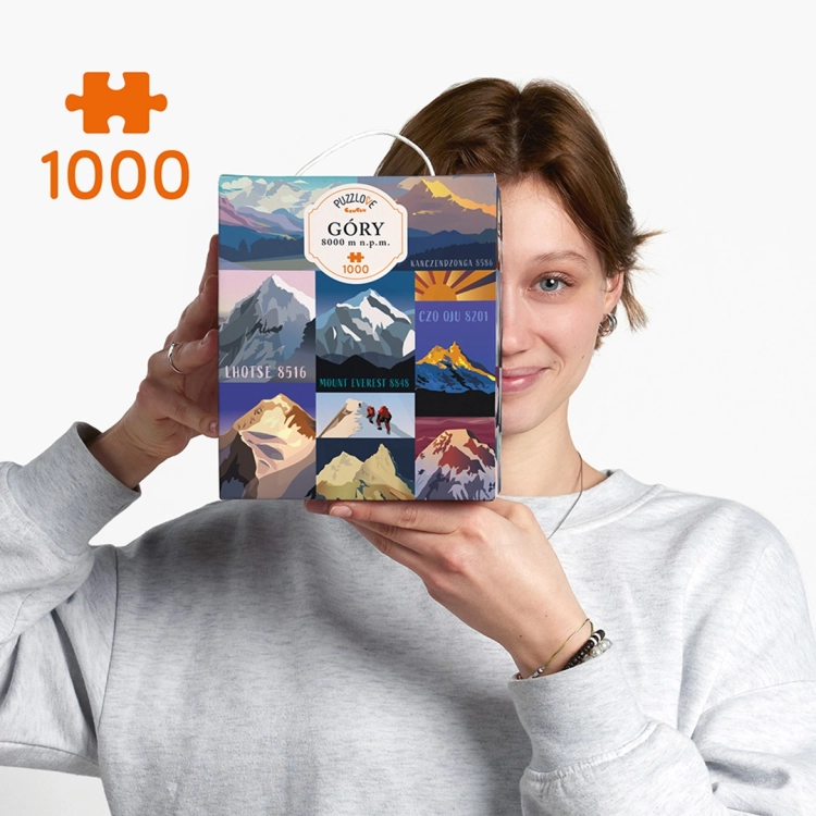 Kobieta prezentująca pudełko puzzli Puzzlove góry 8000 m n.p.m. od CzuCzu