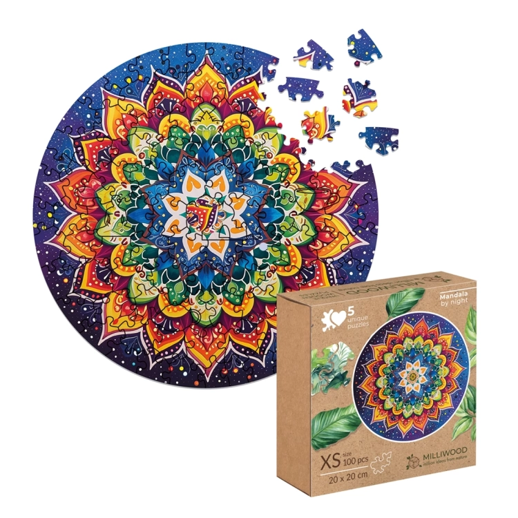 Puzzle mandala nocna z pudełkiem, częściowo rozłożone elementy.