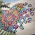 Puzzle Mandala Miłości w trakcie układania z rozsypanymi elementami