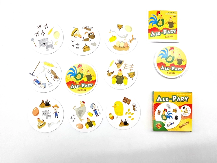 Ale-Pary-Kurnik-gra-karciana-Alexander-4+ (5).webpKompletny zestaw gry Ale Pary Kurnik z pudełkiem, instrukcją i różnorodnymi okrągłymi kartami z ilustracjami zwierząt i przedmiotów.