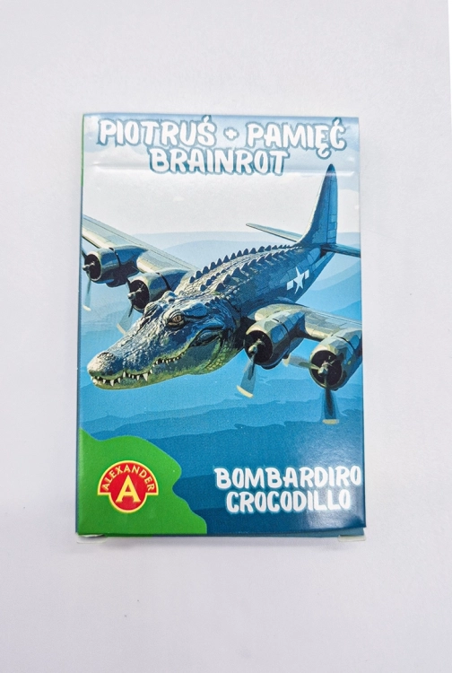 Pionowe ujęcie pudełka gry Piotruś Brainrot Bombardiro Crocodillo, z wyraźną grafiką aligatora-samolotu.