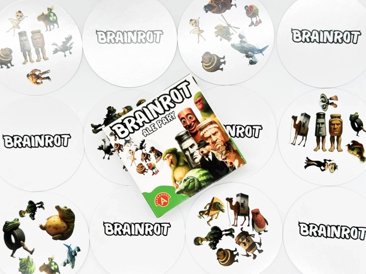 Pudełko gry "Brainrot Ale Pary" na środku, otoczone rozłożonymi okrągłymi kartami z różnorodnymi, surrealistycznymi ilustracjami.