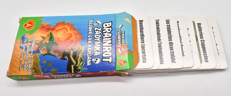 Pudełko gry Brainrot Zadymka z wysypującymi się kartami na białym tle.