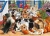 Opakowanie drewnianych puzzli Trefl Wood Craft 1000 elementów Psia Przyjaźń z widocznym obrazkiem psów w ogrodzie.