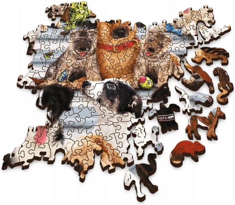 Kolorowa grafika puzzli Trefl Wood Craft Psia Przyjaźń przedstawiająca grupę psów różnych ras wśród kwiatów i dyń.