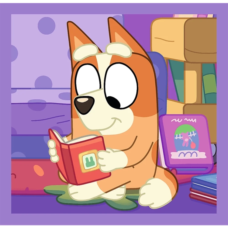 Bingo czyta książkę, scena z puzzli dla dzieci Trefl Bluey.