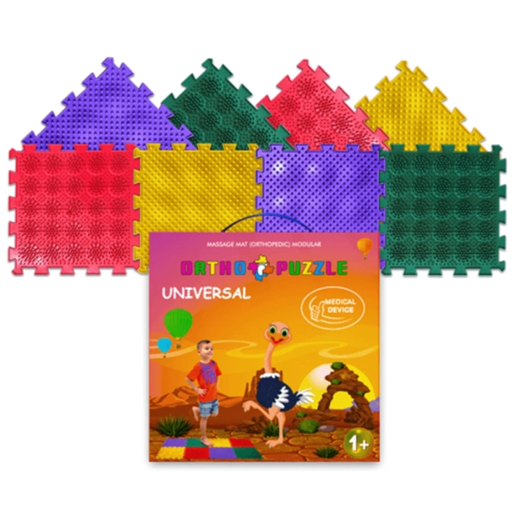 Opakowanie produktu Ortho Puzzle Universal z grafiką chłopca i strusia na tle pustynnego krajobrazu, nad którym widnieje zestaw kolorowych modułów maty.