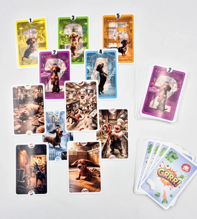 Rozłożone karty do gry wokół dwóch stosów. Widoczne różnorodne ilustracje z psami oraz rewersy kart z motywami warzyw i napisem GRRRR!.