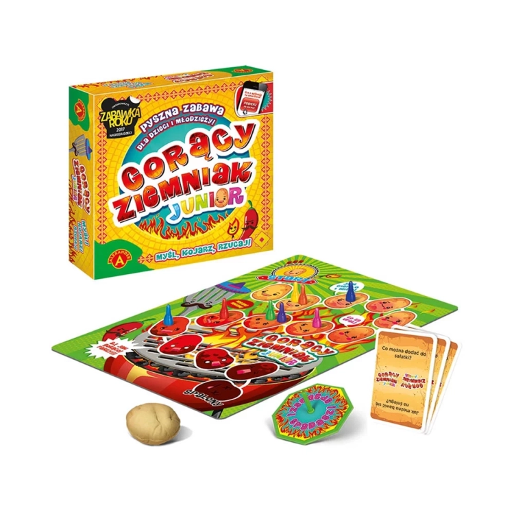 Elementy gry „Gorący Ziemniak Junior”: kolorowa plansza z trasą, talia kart z pytaniami, bączek, pionki oraz pluszowy ziemniak służący do rzucania.