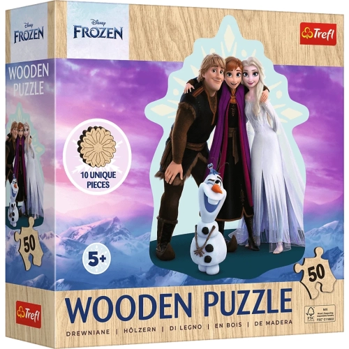 Pudełko drewnianych puzzli Trefl z bohaterami Krainy Lodu: Kristoffem, Anną, Elsą i Olafem na tle gór. Widoczny napis Wooden Puzzle, logo Disney Frozen oraz informacja o 50 elementach.
