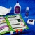 Otwarta instrukcja z przepisami na slimy oraz półprodukty: Slime Glue, aktywator, barwniki i proszek fosforyzujący.